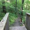 A sturdy bridge aids your passage along the trail.