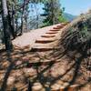 Winding stairs on trail assist you with the ascending terrain.