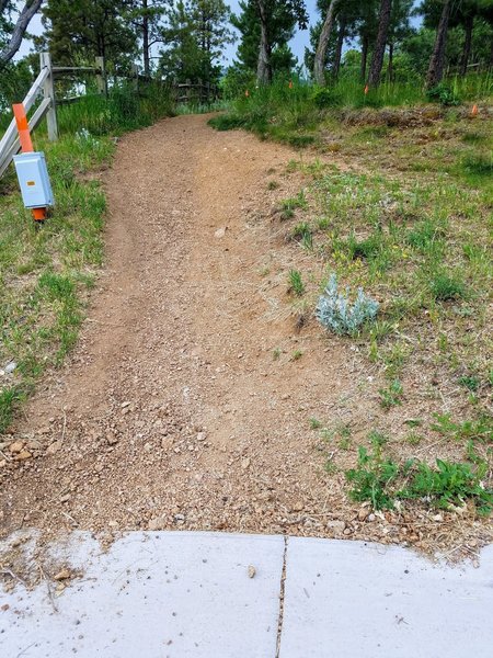 The end of the trail dumps out near 2555 Stratton Forest Heights. There's no trail marker, but the HOA sign states the area is under video surveillance!