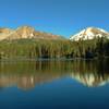 Chaos Crags (left) and Mt. Lassen (right) stand over the east end of Reflection Lake.