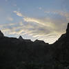 The sun rises over the junction of Bright Angel Canyon and the Colorado River.