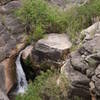 A waterfall cascades in the Devil's Corkscrew region of the Bright Angel Trail.