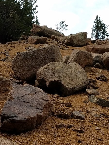 West of the seventh bridge, the trail is replete with boulders. Some scrambling is required.