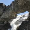 The mini arch and waterfall in early July, locate precisely on the map just off the trail.