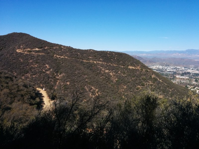 Rosewood Trail as seen from Los Robles trail. The dirt road crossed by Los Robles Trail is shown at the bottom left.