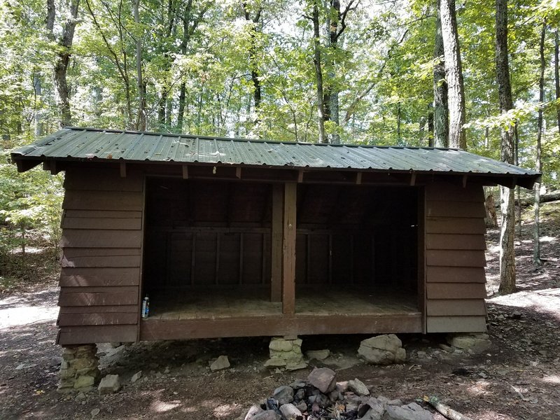 Cove Mountain Shelter. This site is in very good condition. There is a picnic table and fire ring. There is a privy about 200 feet from the shelter.
