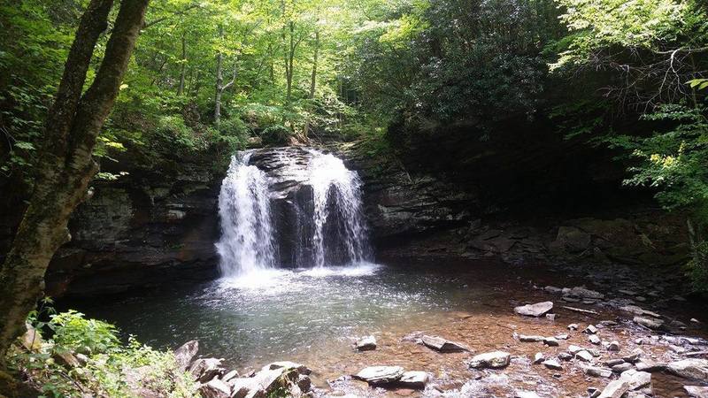 A 30ft waterfall that has a swimming hole under it.