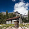 Sierra Club Horse Camp in front of the cloudy summit of Mount Shasta