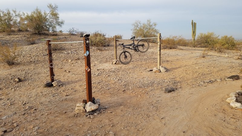 Bicycle racks and resting point with log circles good place to take small break