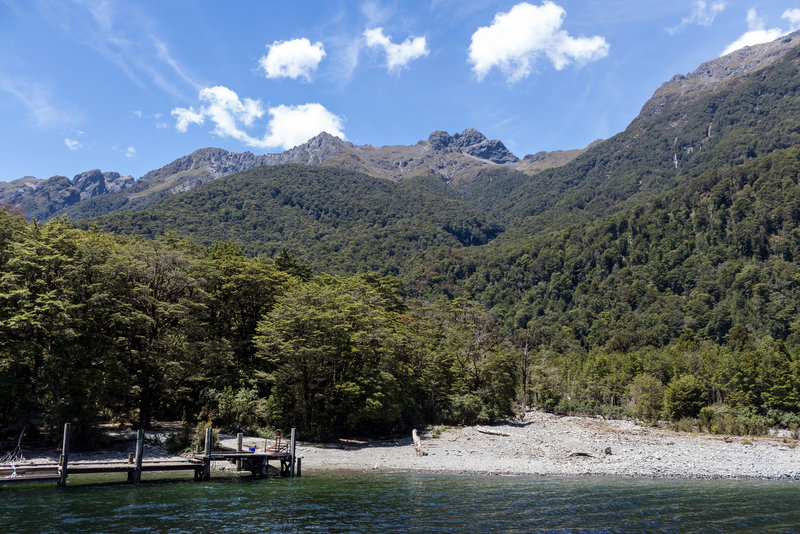 Glade Wharf - the starting point of the Milford Track with Dore Pass in the back