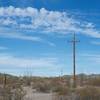 The power line corridor, which is open to hiking and horseback riding, intersects the Palo Verde at this point and heads North and South through the monument.