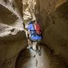 Stepping down into the slot canyon