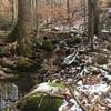 Trail next to scenic stream, just before cascade.