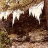 Icicles over 5 ft long hanging over a trail.