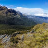 Panorama from the Routeburn Track with Lake Mackenzie to the left and the clouds moving into the Hollyford Valley to the right