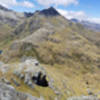 Panorama across Lake Harris, Harris Saddle, and the Hollyford Valley