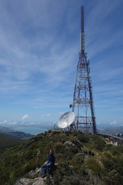 Radio tower and antenna dish at the top of Mount Cargill