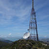 Radio tower and antenna dish at the top of Mount Cargill