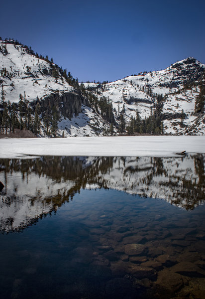 Eagle Lake, looking southwest at surrounding unnamed peaks (8499, 8197). Mostly frozen but slowly thawing.