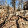 Dark shadows play among interesting rock formations on the Long Path is Harriman State Park