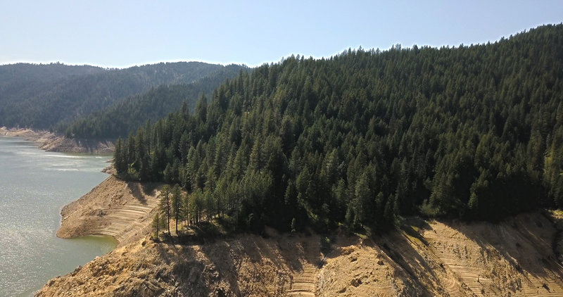 This trail winds around the lake. This is picture from a drone looking back at the edge. The headlands contain camping sites for boaters and hikers.