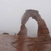 Rain and snow at Delicate Arch in February.
