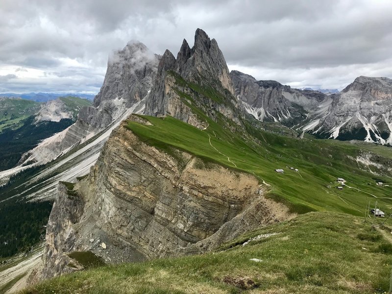 Beautiful view of outcroppings and distant mountain views from the summit of Seceda.
