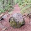 There are 2 small boulders on the trail, this is one.  It's only an issue if you're a cyclist or on horseback.