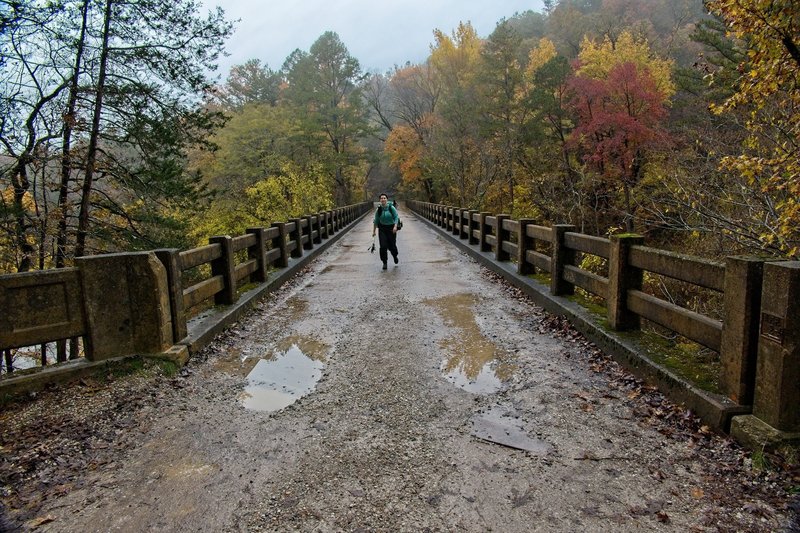 Trail crosses bridge at Gunner Pool Recreation Area.