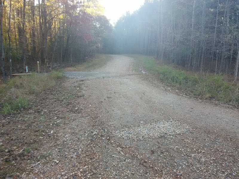 Trail extension and entrance to Mountain Trail on left.