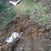 A small section of the trail is washed out when you hit snow. It is not difficult to pass.