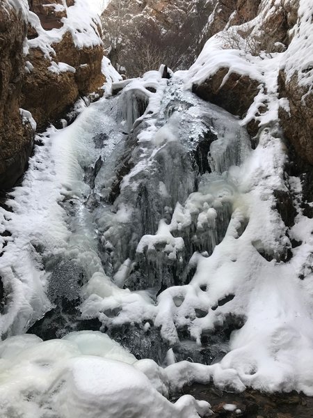 Heughs Canyon Waterfall, mostly frozen in January, 2019.