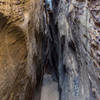 Debris is stuck in Burro Wash and requires you to carefully navigate this very confined slot canyon.