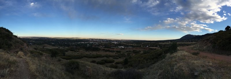 Dusk panorama of Colorado Springs to the NE. L-R you can see Pulpit Rock, Palmer Park, Bear Creek and Cheyenne Mountain.