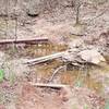 Washed out footbridge replaced with single plank across small creek. New Deal Trail, Lake Murray State Park, OK
