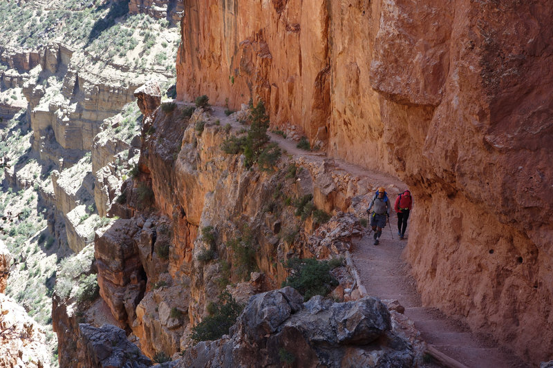 Two hikers ascend the North Kaibab trail