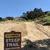 Steep trail sign.