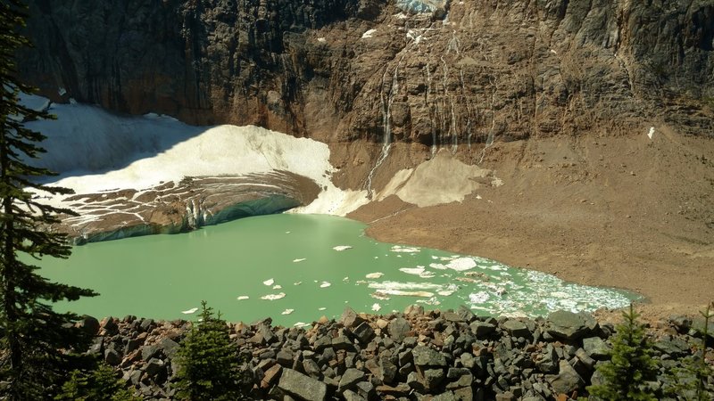 Cavell Pond, below Cavell Meadows Trail, is filled by cascading melt water and ice from Angel Glacier.