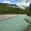 The beautiful, turquoise Blaeberry River in the mountains. Thompson Falls Trail runs next to it here.