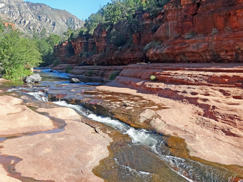 "Slide Rock State Park, Oak Creek Canyon, AZ 9-15" by Don Graham (https://www.flickr.com/photos/23155134@N06/) licensed under CC-BY-SA 2/0 (https://creativecommons.org/licenses/by-sa/2.0/).