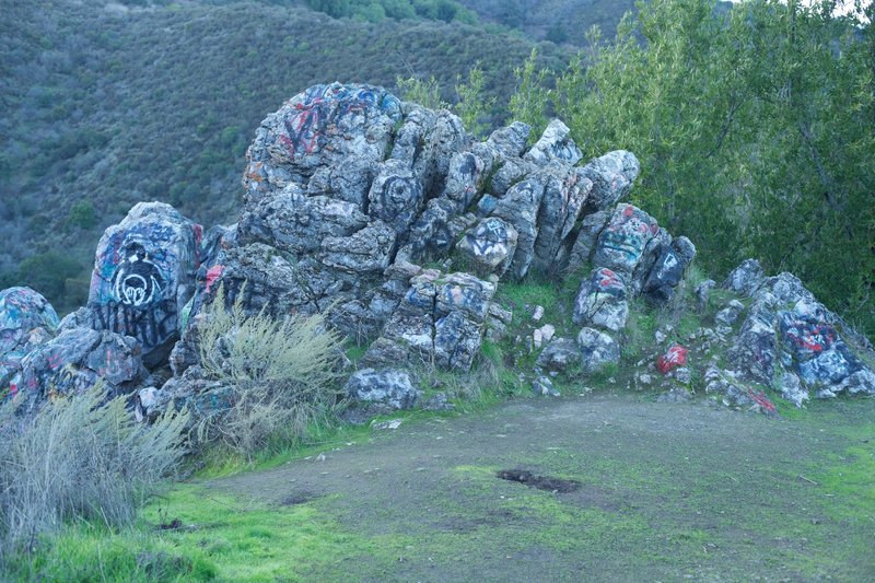 Rocks along the trail are covered with graffiti.