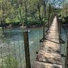 Hike starts and ends using a wobbly bridge over the Maury River.