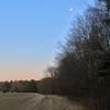 Trail is unmarked but follows the edge of large field.