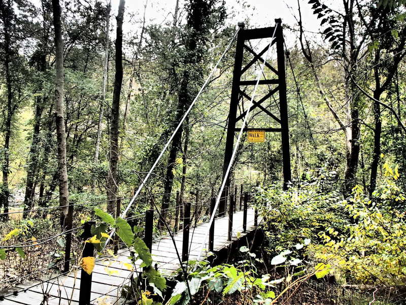 The Swinging Bridge greets riders as they pass over the Patapsco River