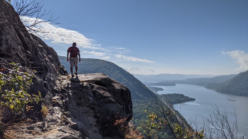 Test yourself (and your nerve) with the rock scrambles of Breakneck Ridge, the trail goes left from here, up that steep incline to the left of the hiker.
