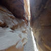 Direct sun shining through a narrow section of Little Wild Horse Canyon