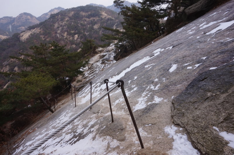 Bukhansan Traverse towards Hyangnobong Peak. This is the first tricky bit on the trail.  If you find this hard and if you are walking at your limit then you need to think hard about carrying on and maybe time to take one of the many paths off the trail.