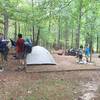 Scout troop setting up camp.
