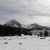 Looking southeast from trail near 4-in-1 Cone after fall snow. Collier Crater, North Sister and Little Brother (L-R).