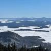 Summit in late Feb looking towards Squam, Winni is further out, Belknap Range in upper right